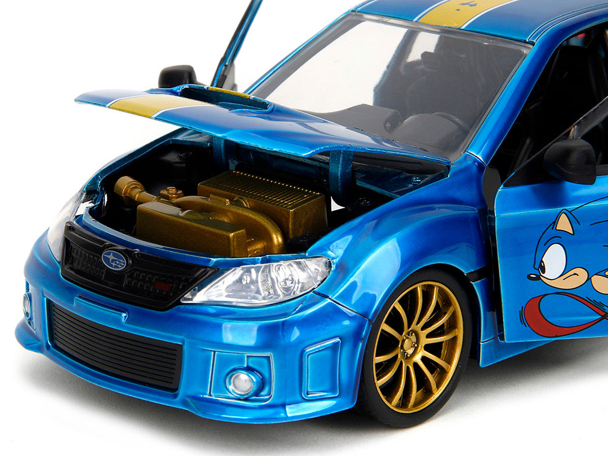 2012 Subaru Impreza WRX STI Blue Metallic with Graphics and Sonic The Hedgehog Diecast Figure "Sonic The Hedgehog" "Hollywood Rides" Series 1/24 Diecast Model Car by Jada