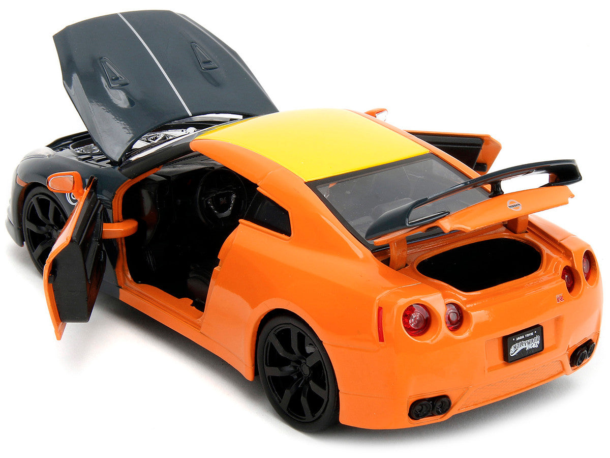 2009 Nissan GT-R (R35) Orange and Dark Gray with Yellow Top and Graphics and Naruto Diecast Figure "Naruto Shippuden" (2009-2017) TV Series "Anime Hollywood Rides" Series 1/24 Diecast Model Car by Jada